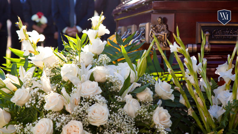 White flowers laying down. Call us today. 